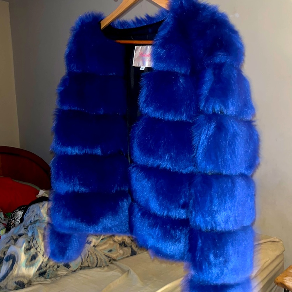 Bright beautiful blue faux fur jacket